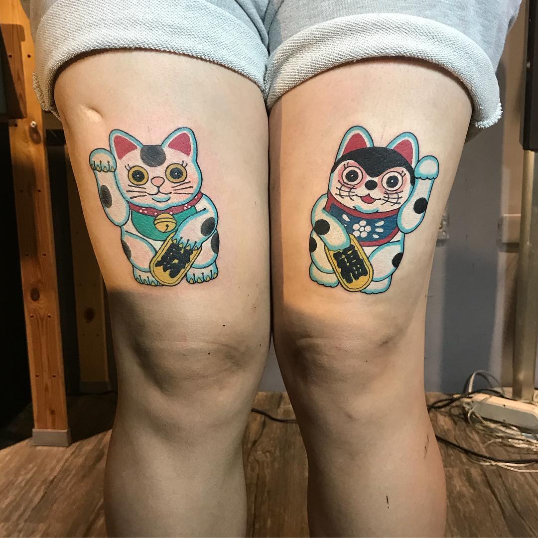 宁小姐大腿招财猫纹身图案